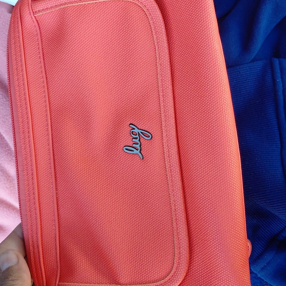 Orange Toiletry Bag New. .Lug